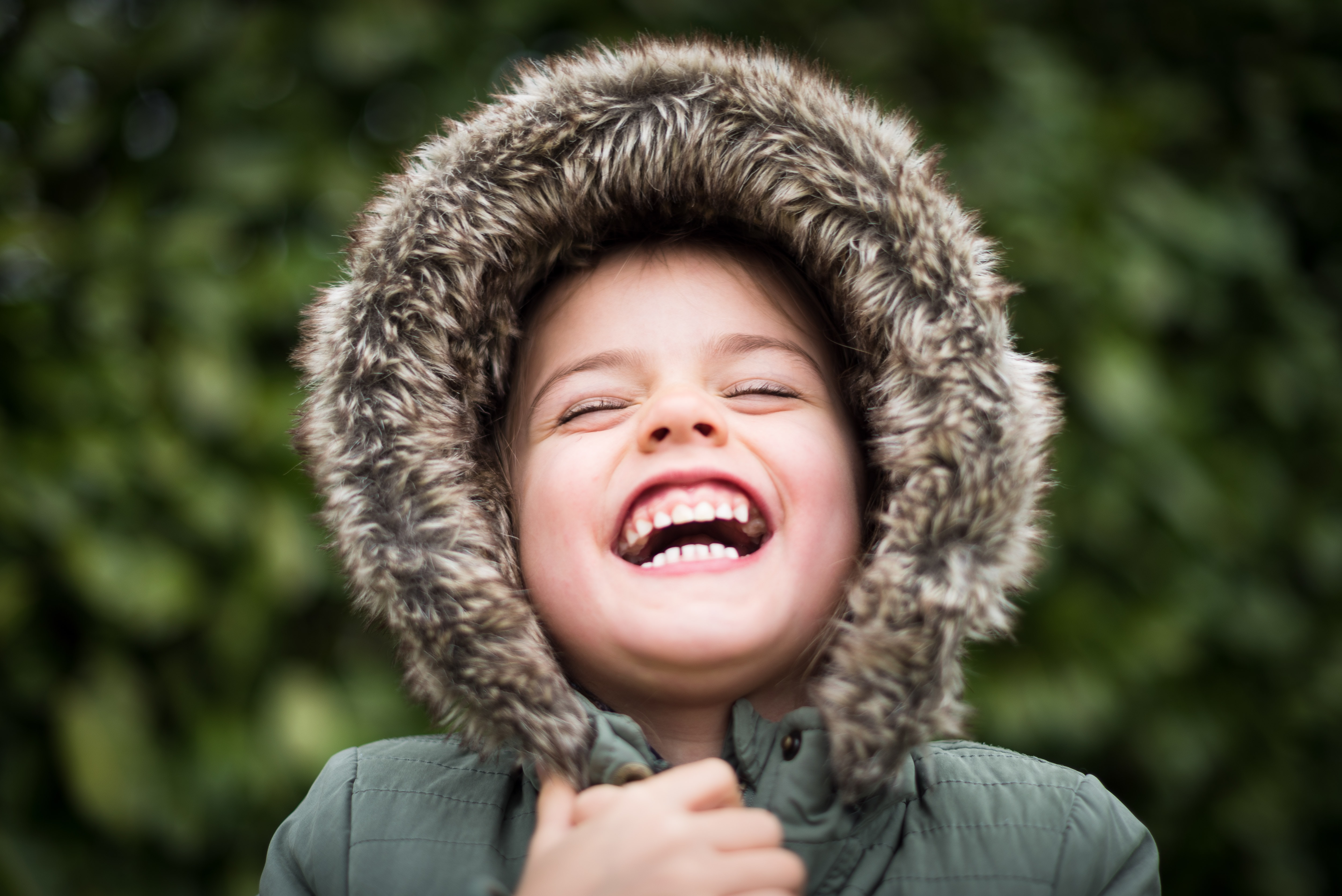 Churchich Recreation Benefits of Playing Outside Kid in Winter Coat Laughing